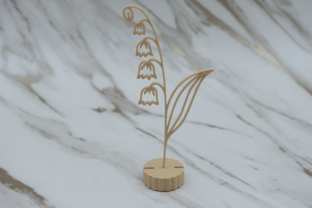 Geboorte bloem met voetje